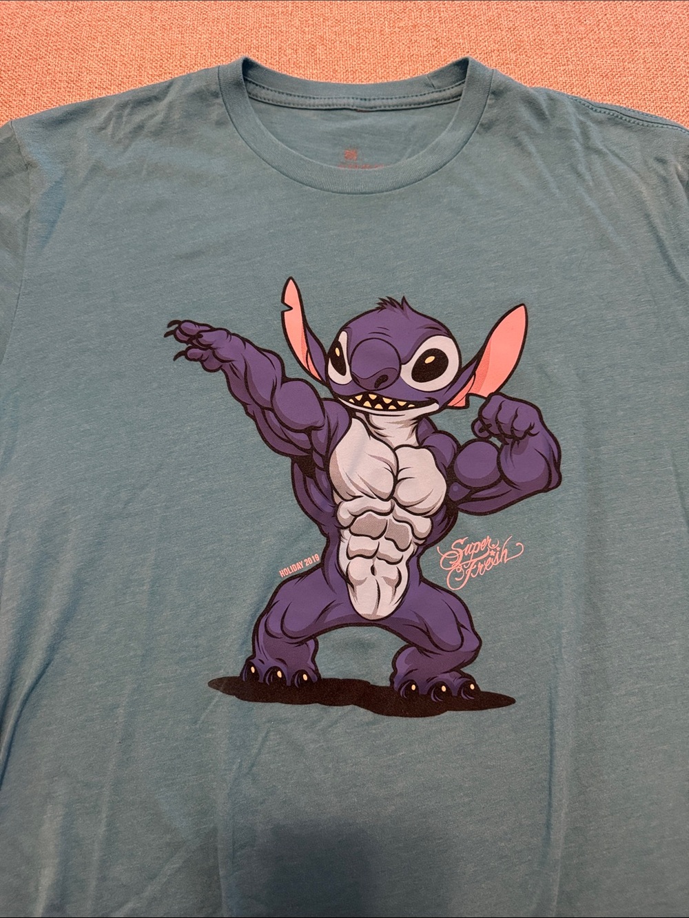 Men's Teal Short-Sleeve Graphic Tee with Muscle Stitch Print